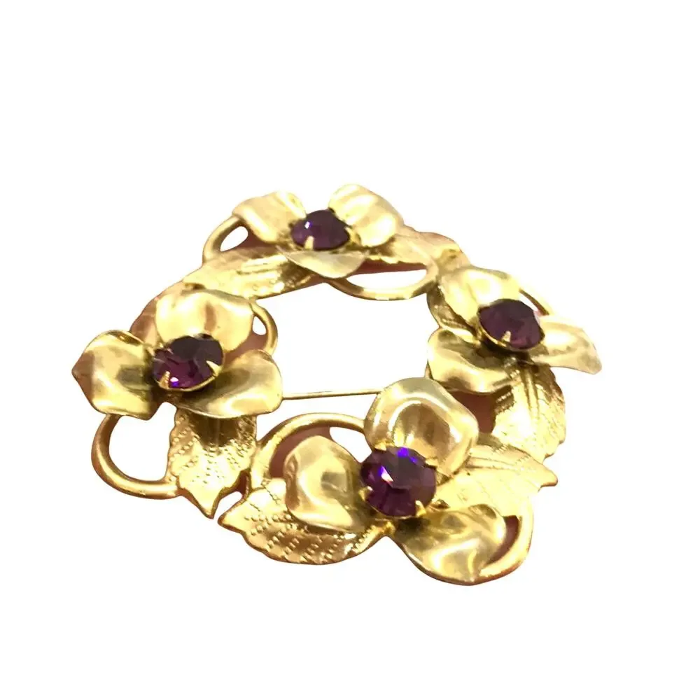 Vintage goldtone & purple rhinestones wreath brooch ornate dimensional jewelry